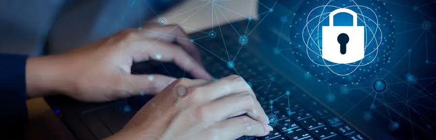 Hands typing on a laptop keyboard with a glowing lock icon, representing cybersecurity and data protection.